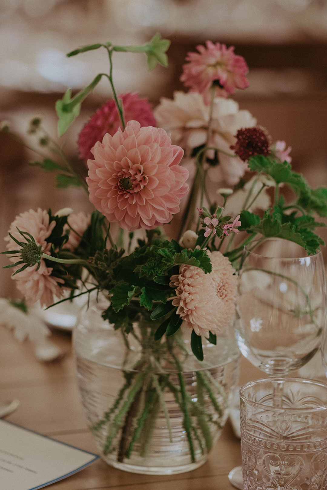 Pink, peach dahlia wedding table flowers