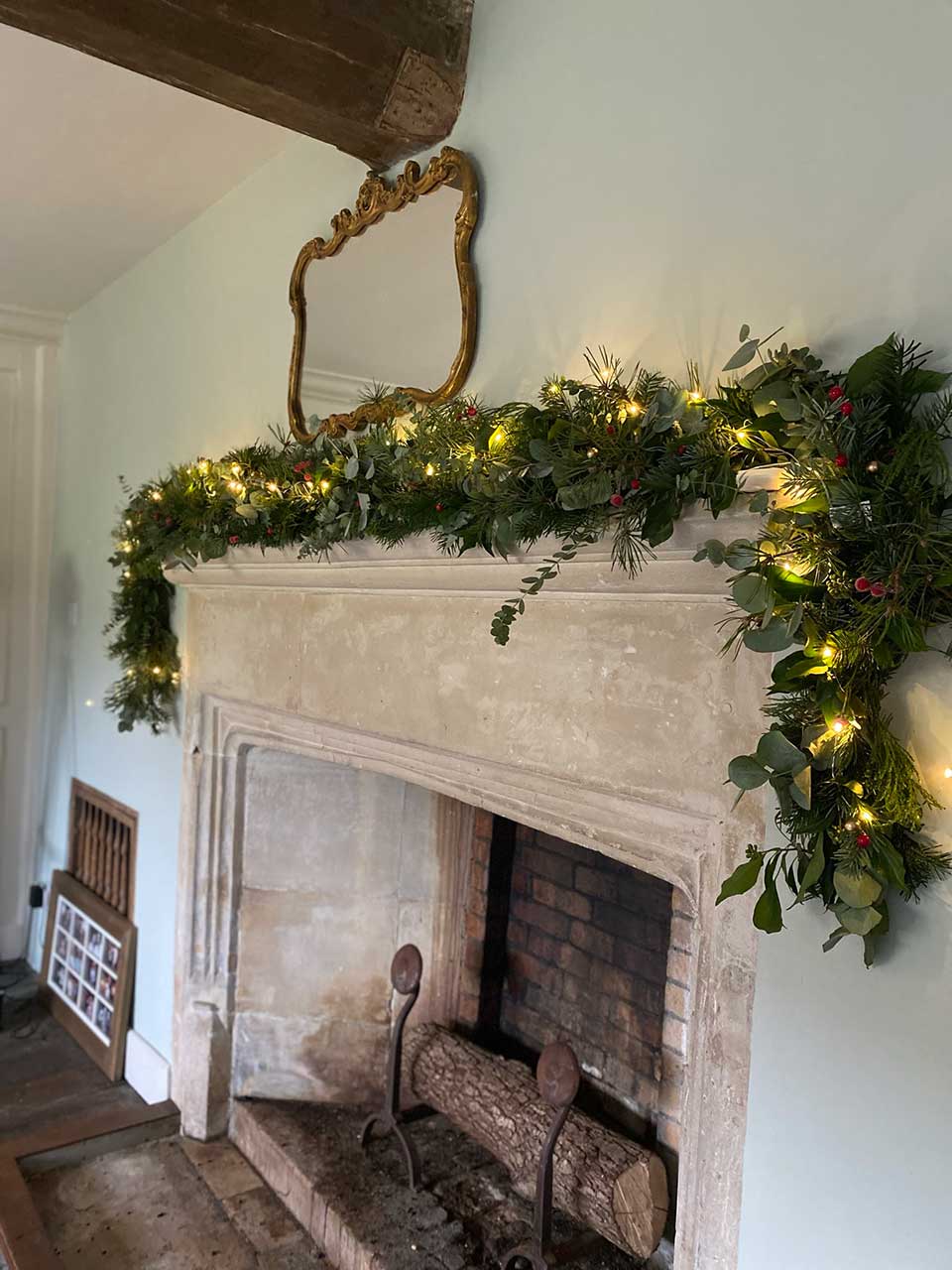 Christmas Garland over traditional fireplace
