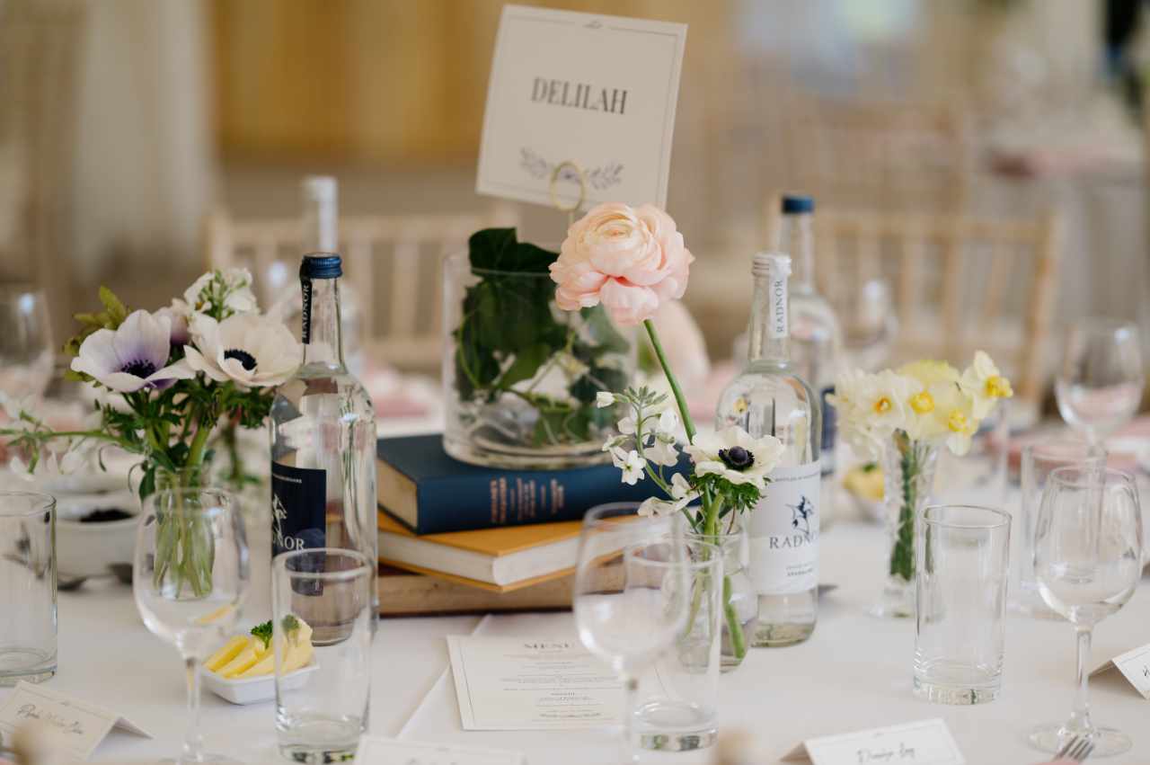 Books and flowers wedding table design