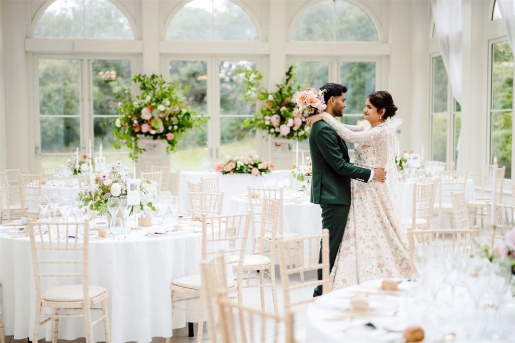 Bride and Groom in the Orangery of Clevedon Hall